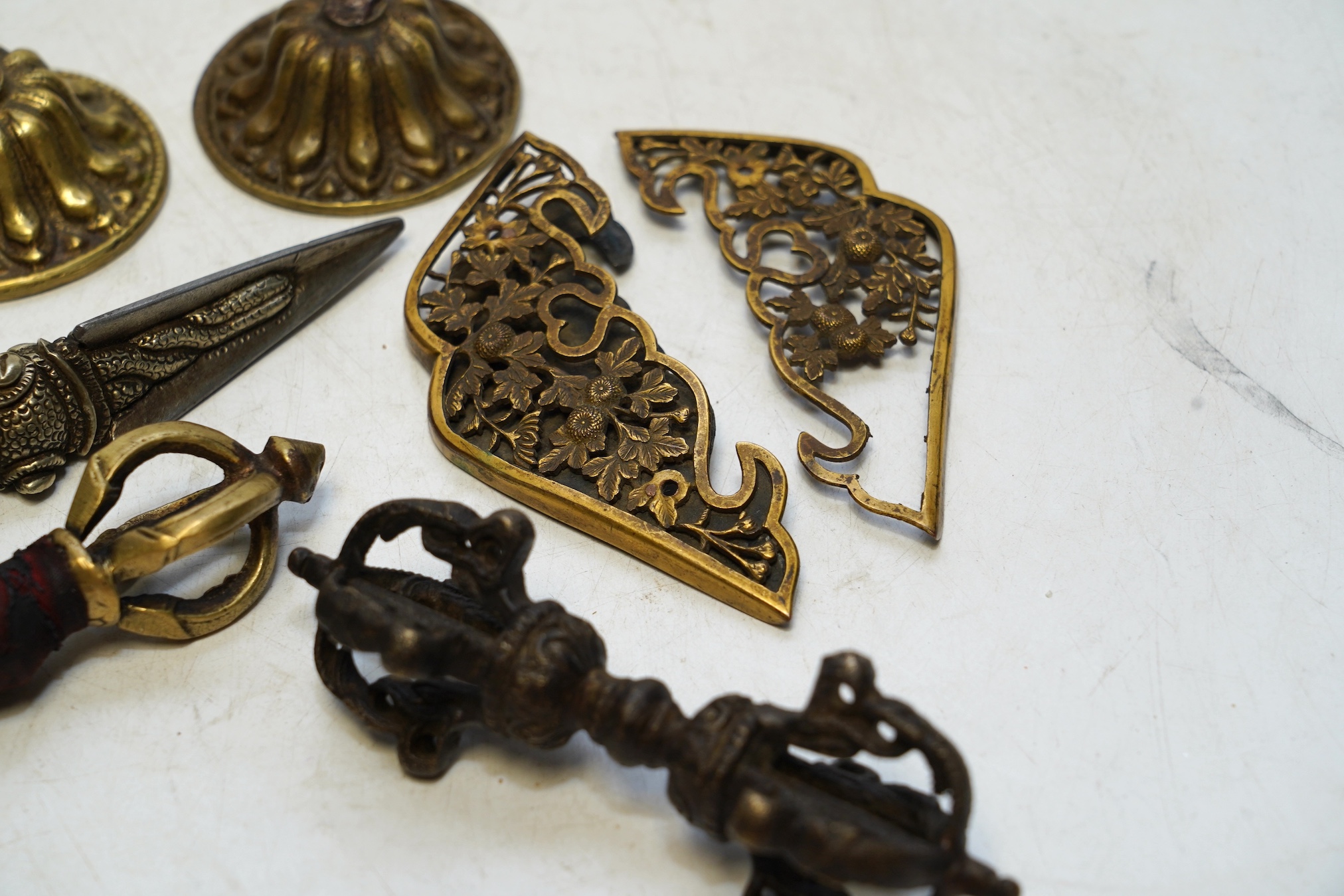 Chinese and Tibetan metalware including a phurba, largest 14cm. Condition - fair